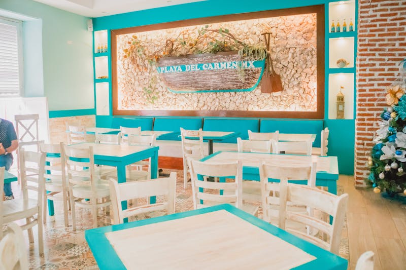Costa Vida restaurant interior with coastal decor and fresh food preparation